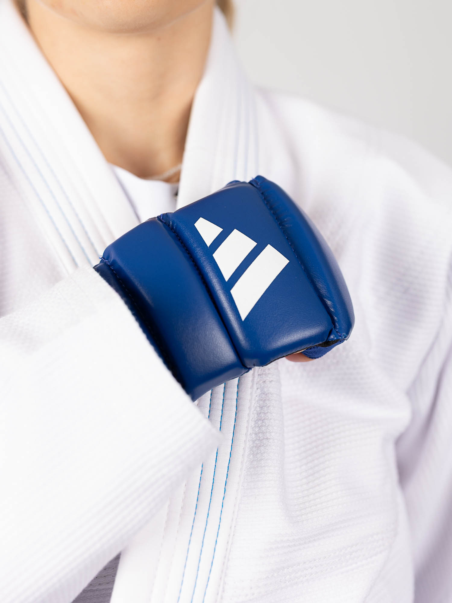 blue glove, padded glove, martial arts, gauntlet, knee?