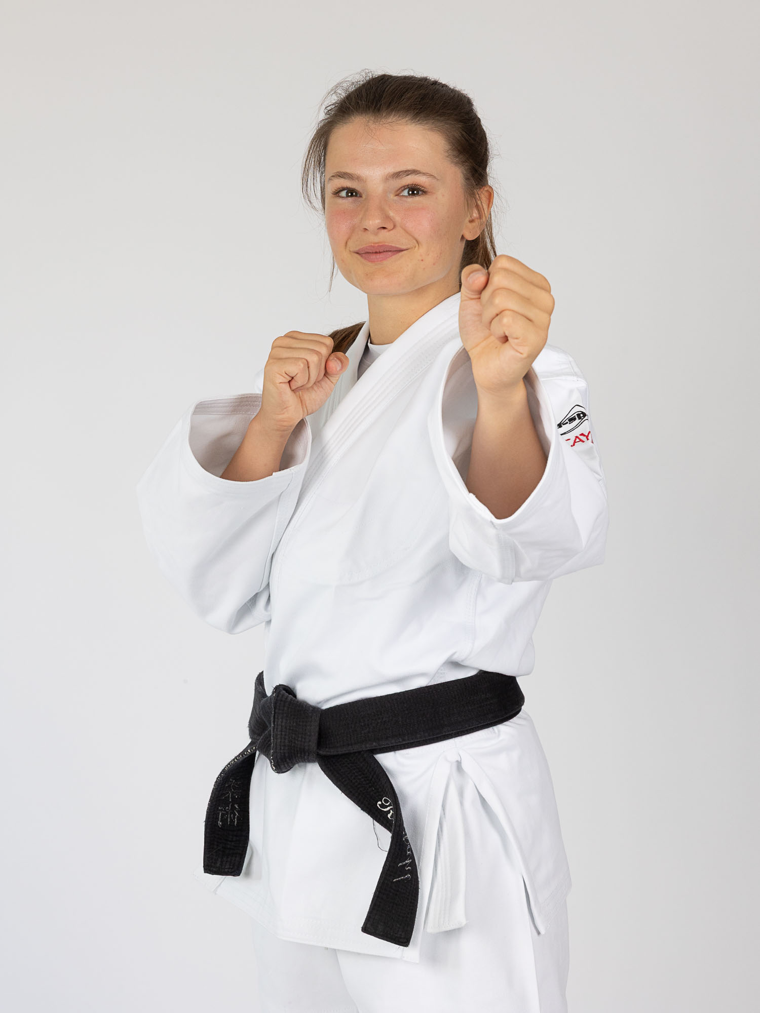 Judo Gi, Schwarzer Gürtel, Weißes Karate-gi, Gürtel gebunden, Sportkleidung