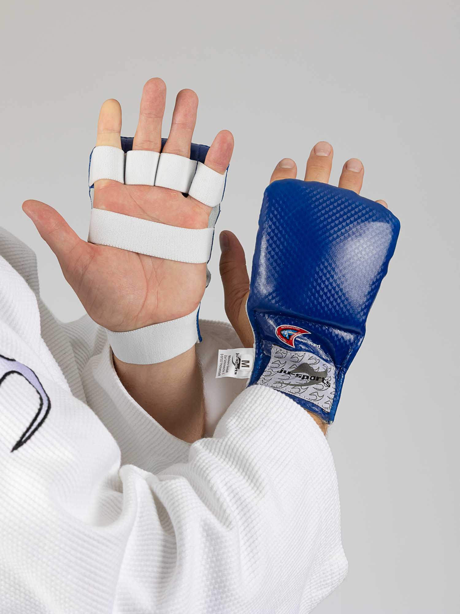 Fußschiene, Handbandage, blauer Handschuh, Kampfsport, Daumenstütze