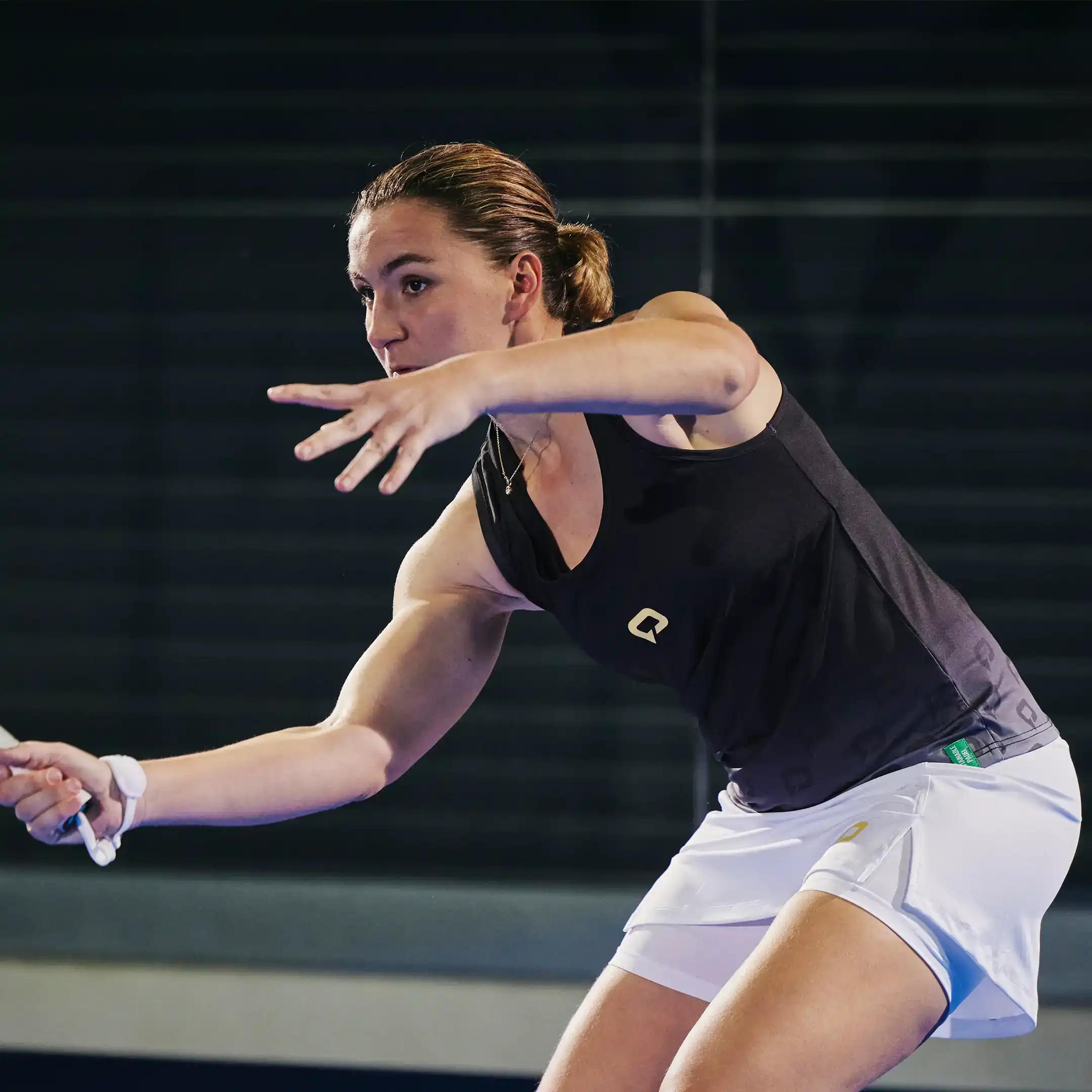3_PTTW002BC-pallap-padel-sport-apparel-women-competition-top-black-mat-gold-action-01