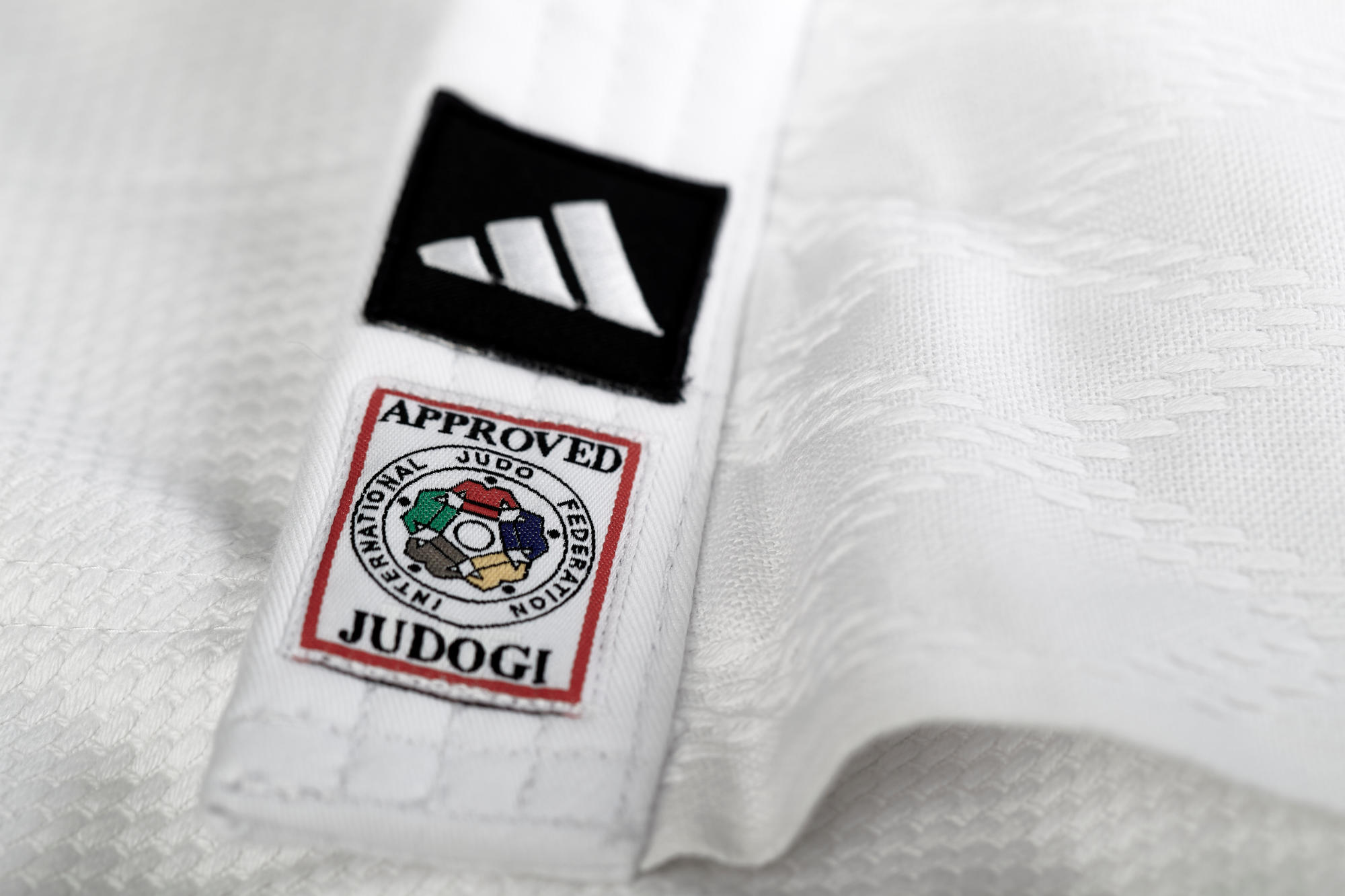 adidas Judoanzug CHAMPION III IJF - Model 1 weiß/schwarze Streifen JIJFS